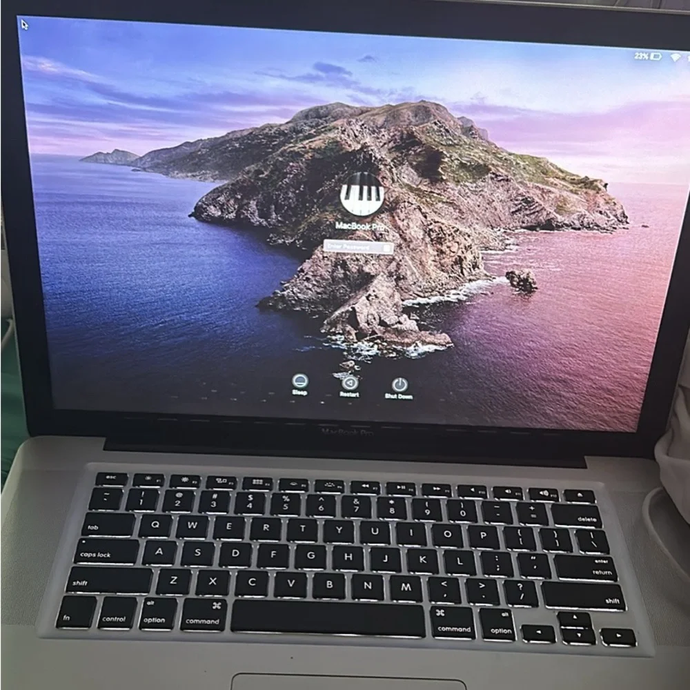 This is a MacBook Pro that comes with a charger and it’s 15 inches NC ONLY
